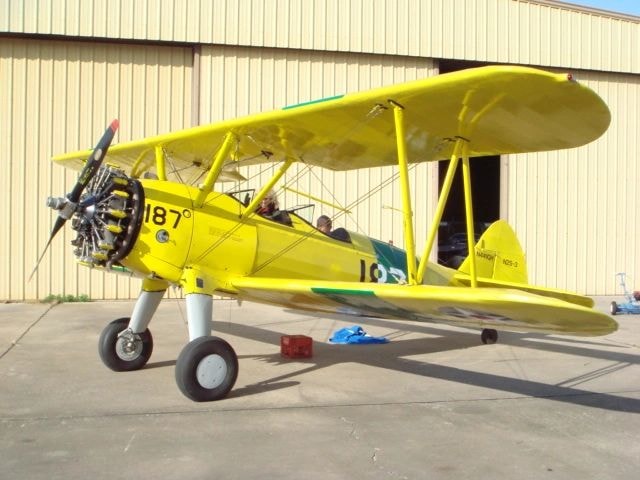 Yellow Decathlon aircraft N5026N in hangar